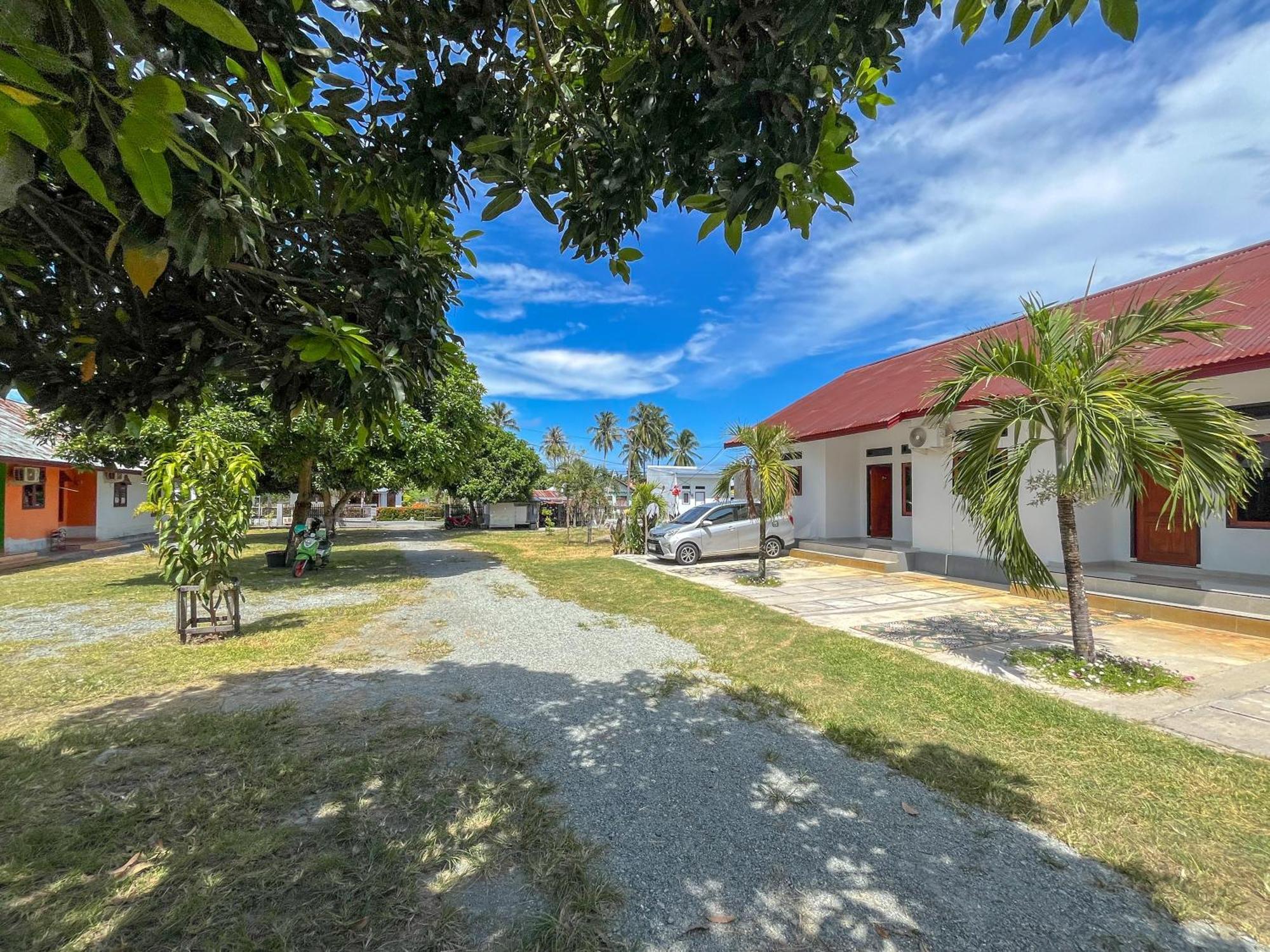 Reddoorz Syariah At Home Ampana Guest House Ampana Kota ภายนอก รูปภาพ